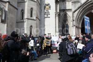 1363186471-disabled-campaigners-at-the-high-court-protest-against-ilf-cuts_1868510
